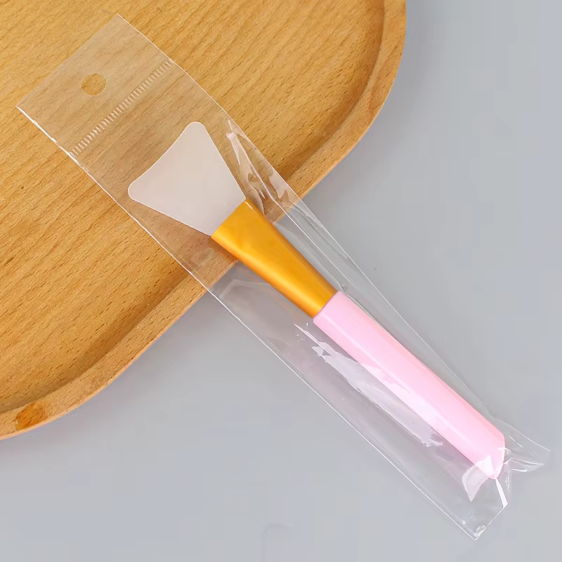 Pinceau applicateur de masque facial en silicone à tête souple, pour masque de boue DIY, avec queue