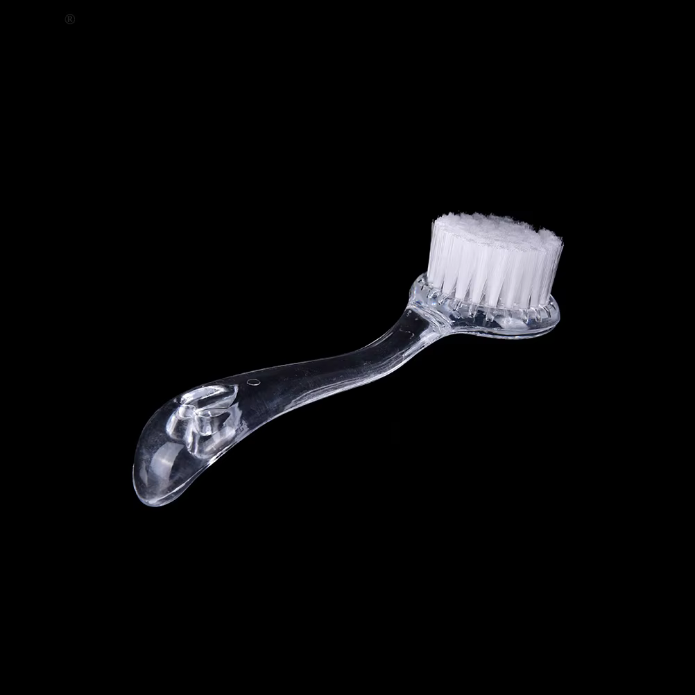 Brosse nettoyante et exfoliante en plastique pour le lavage du visage