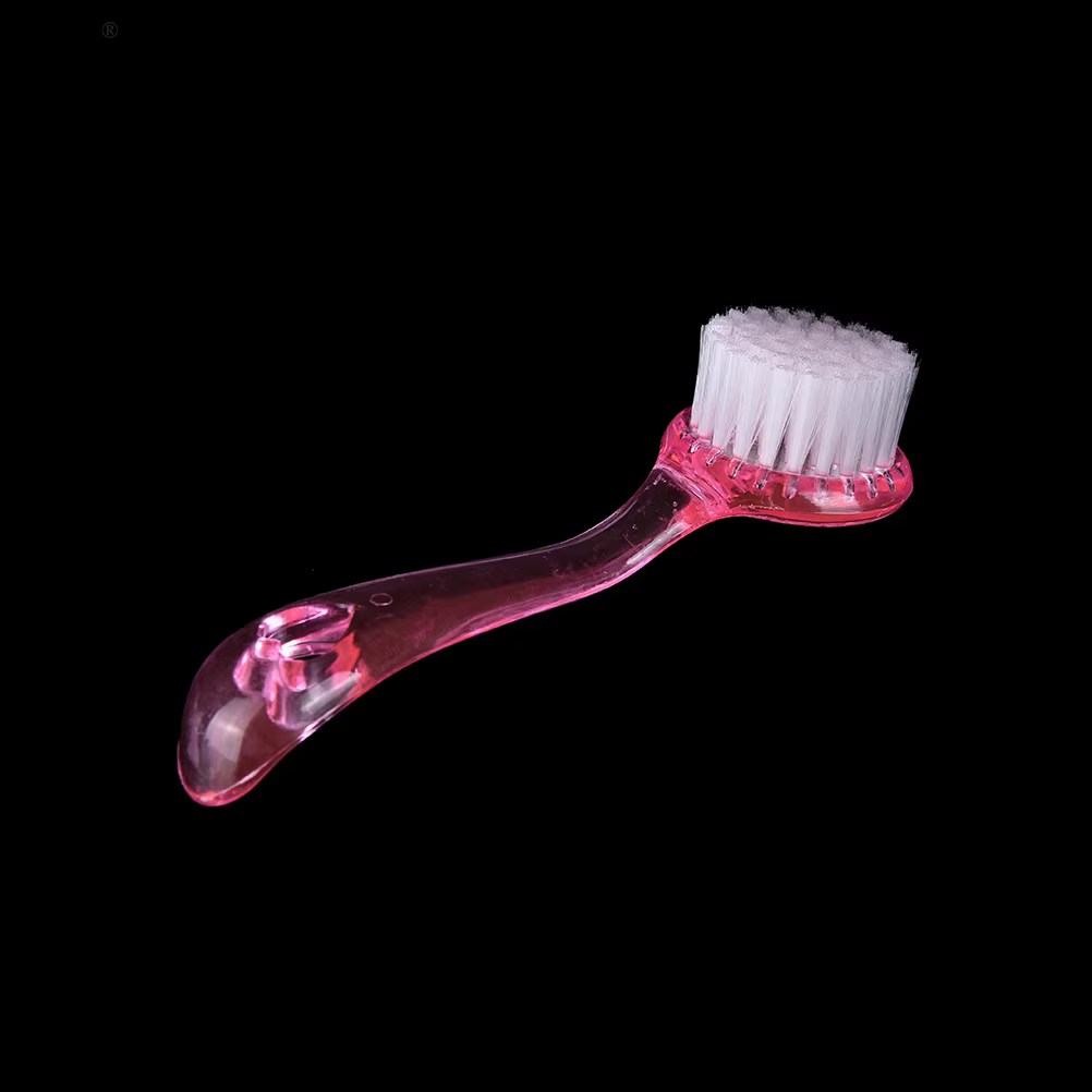 Brosse nettoyante et exfoliante en plastique pour le lavage du visage