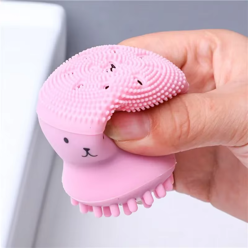Brosse faciale poulpe rose avec éponge