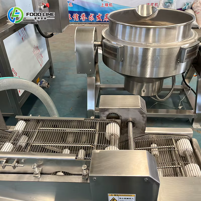 Friteuse industrielle pour nuggets de poulet et ailes de poulet panées