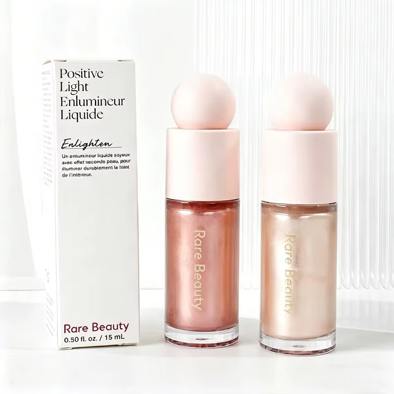 Rare Beauty – Liquide Réparateur Visage 3D Haute Brillance Texture Légère pour un Maquillage Éclatant Longue Durée et un Fini Nacré Subtil