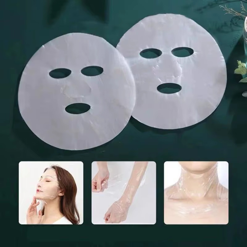 Masque PE jetable Transparent pour tout le visage, masque universel de soins de la peau pour les soins de beauté, accessoires hydratants, 100 pièces