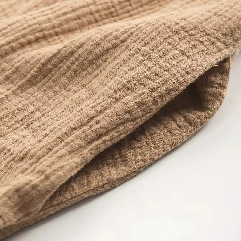 Robe élégante et jolie en mousseline 100% coton pour femmes, robe sexy à col en V sans manches avec volants, robe chic pour les vacances à la plage