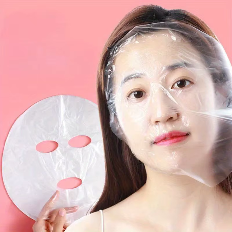 Masque PE jetable Transparent pour tout le visage, masque universel de soins de la peau pour les soins de beauté, accessoires hydratants, 100 pièces