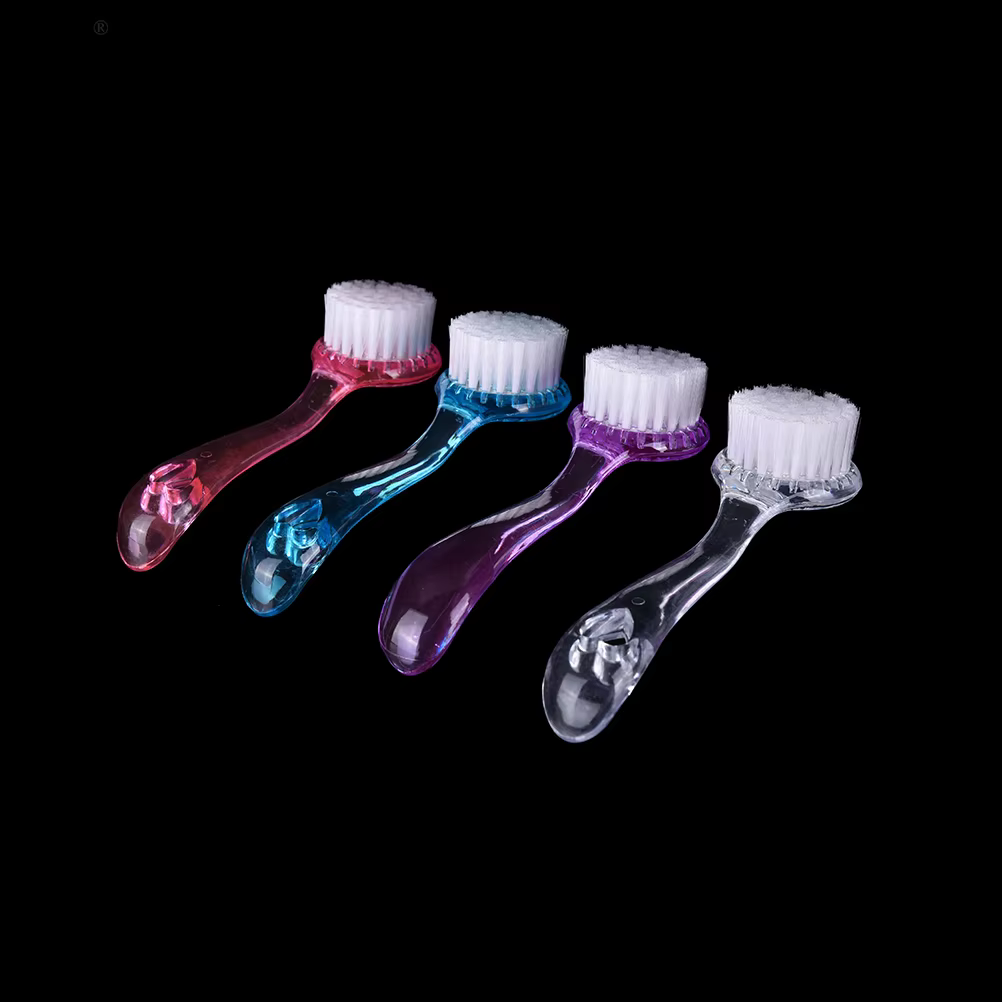 Brosse nettoyante et exfoliante en plastique pour le lavage du visage